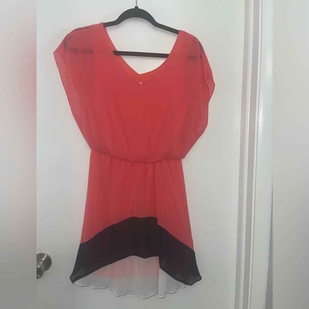 Size small/ peach color above knee length dress.